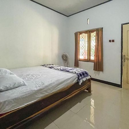 Ekas Beach Guesthouse Mitra Reddoorz Exterior photo