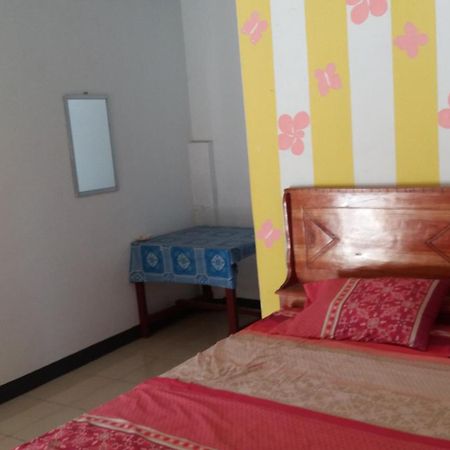 Ekas Beach Guesthouse Mitra Reddoorz Room photo