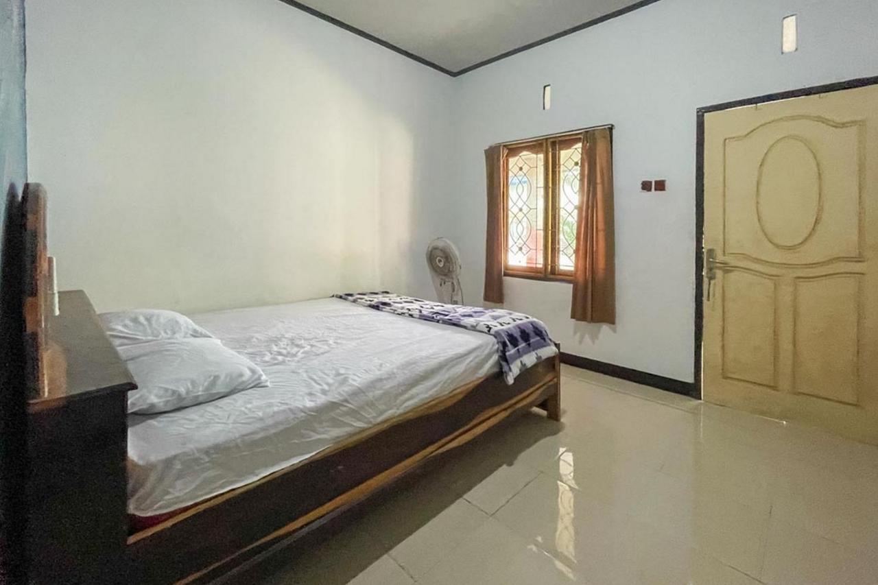 Ekas Beach Guesthouse Mitra Reddoorz Exterior photo