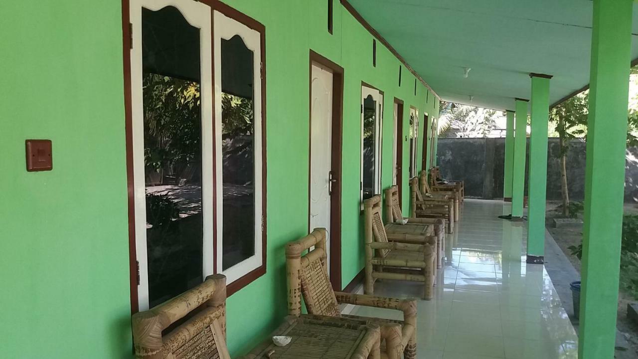 Ekas Beach Guesthouse Mitra Reddoorz Exterior photo